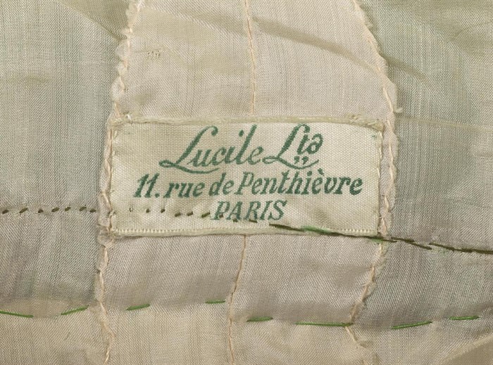 Label from an item of clothing made by Maison Lucile's Paris business.